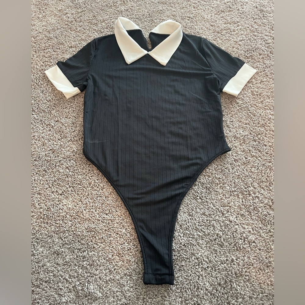 Black and white body suit